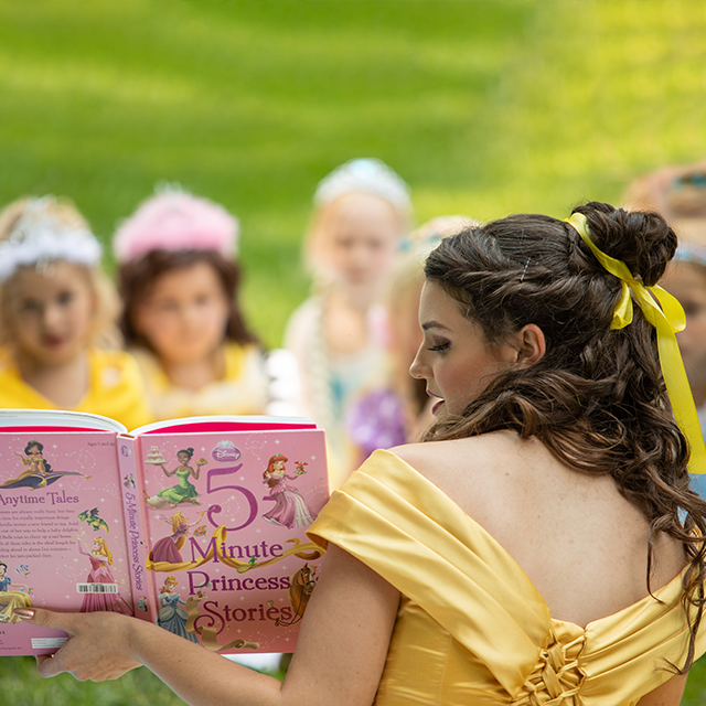Reading books is one of Belle’s favorite pastimes. She’ll read your little one a book with the help of The Princess Party Co.